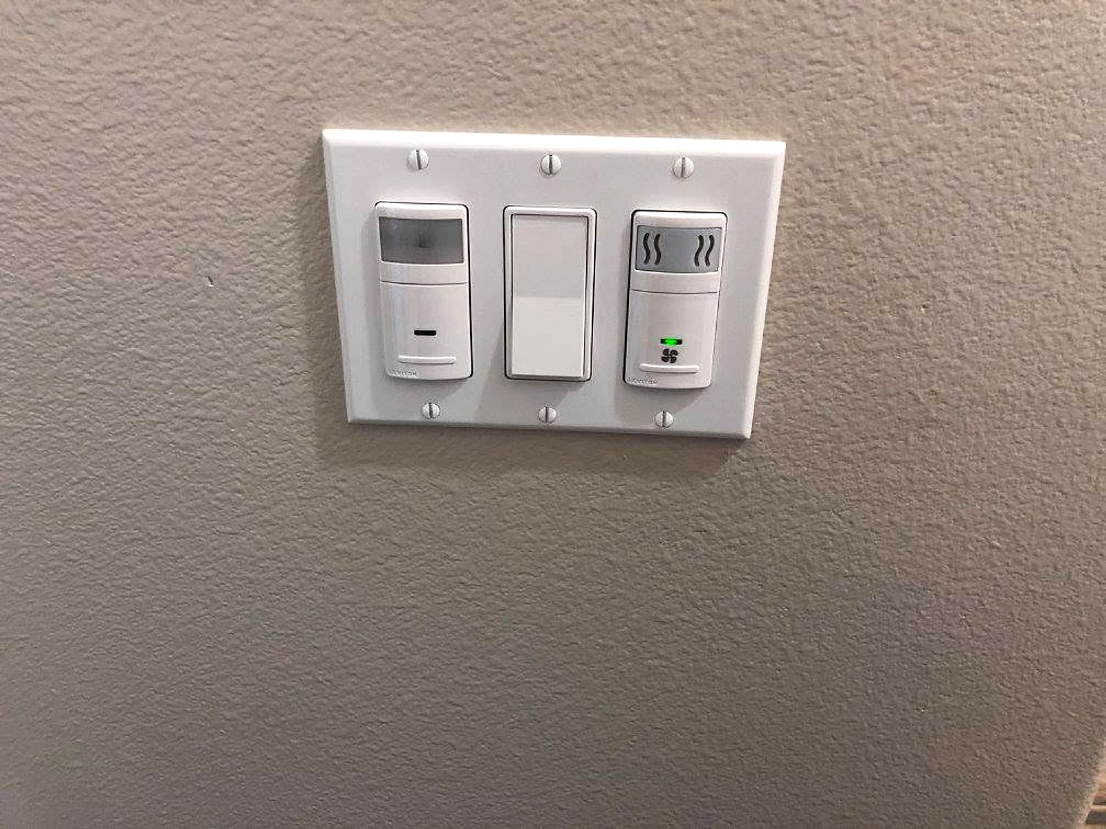 Three-gang plate with occupancy sensor, switch and heater timer